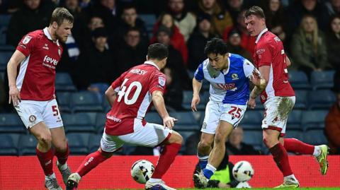 Blackburn's Ryoya Morishita vies for possession with Bristol City's Sam Morsy