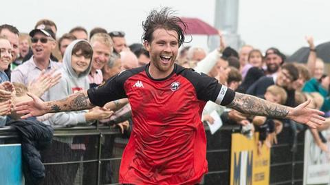 Tyler Harvey celebrates scoring for Truro City