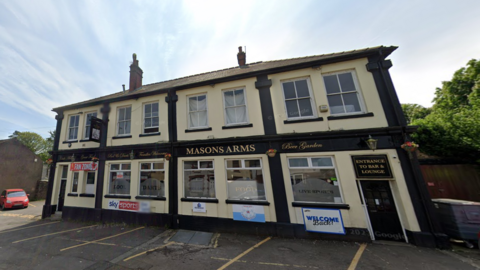 A street view shot of Masons Arms in Caerphilly. 
