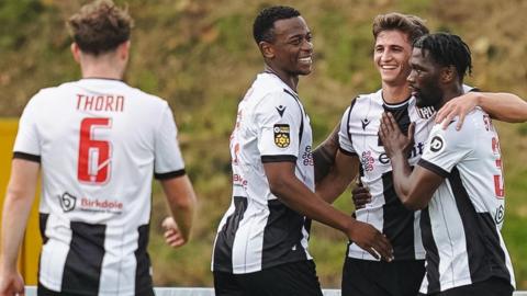 Darren Stephenson celebrates after scoring Flint's early opening goal at Llanelli