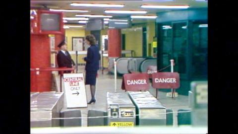 Entrance point at Oxford Circus tube station with danger signs and a sign reading CENTRAL LINE ONLY.