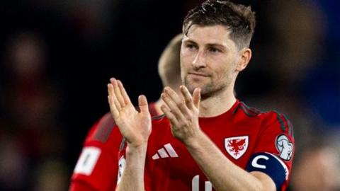 Ben Davies applauds Wales' fans