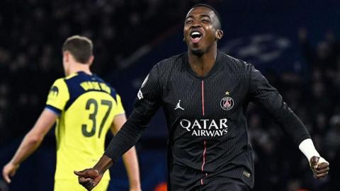 Willian Pacho celebrates after scoring Paris Saint-Germain's fourth goal against Spurs in the Champions League.