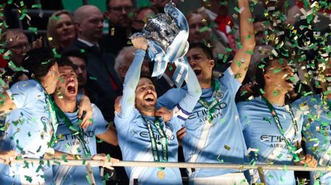 Bernardo Silva lifts the trophy