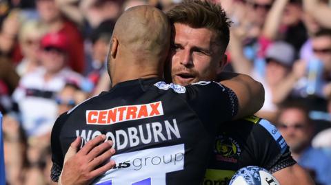 Henry Slade celebrates a try