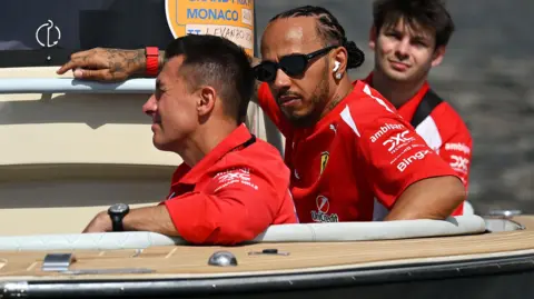 Lewis Hamilton arrives at Monaco on Saturday on a boat