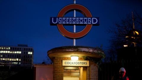 Cockfosters Underground station pictured at night