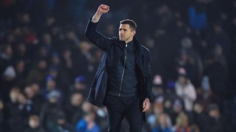 Portsmouth boss John Mousinho celebrating their win over Stoke.