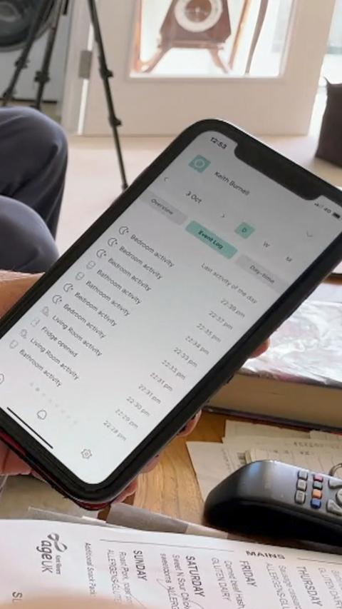 A smart phone screen which shows activity within a house.