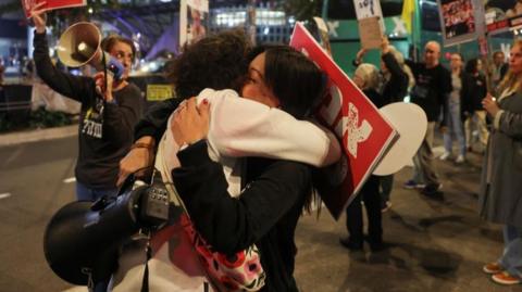 Supporters of Israeli hostages, who were kidnapped during the deadly October 7 2023 attack by Hamas, react to news on the Gaza ceasefire negotiations, during a protest to demand a deal to bring every hostage home, in Tel Aviv, Israel, January 15, 2025.