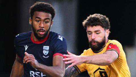  Ross County's Elijah Campbell and Livingston's Jamie Brandon