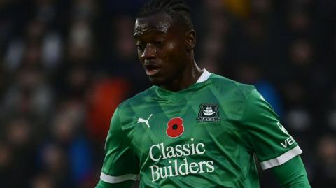 Mustapha Bundu in action for Plymouth Argyle 