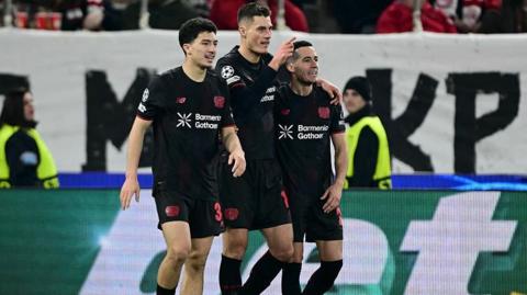 Patrik Schick celebrates with his Bayer Leverkusen team-mates