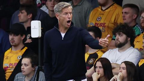 Newport manager Dave Hughes shouts from the touchline