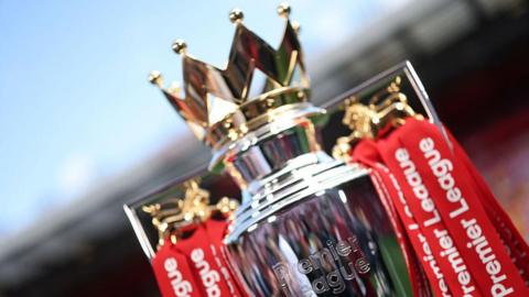 An image of the Premier League trophy 