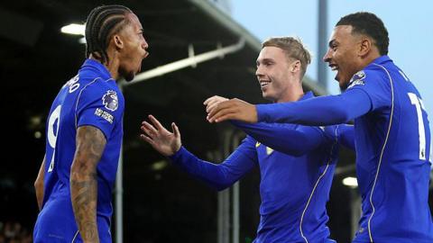 Joao Pedro of Chelsea celebrates scoring his team’s first goal with teammates Cole Palmer and Morgan Rogers