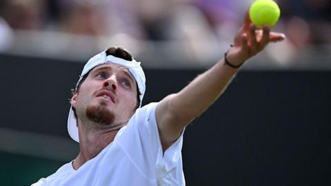 Toby Samuel serves