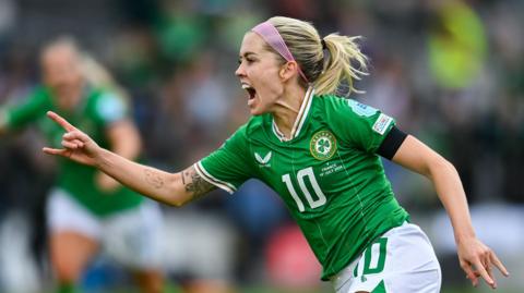 Denise O'Sullivan celebrates her goal against France