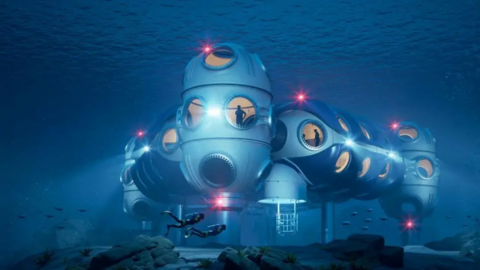 Computer image of underwater pod made up of five sections with red lights on the outside. Two divers are swimming in the foreground. 