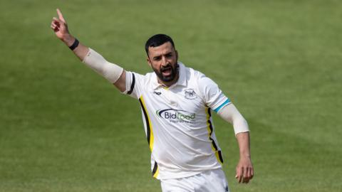 Zafar Gohar celebrates taking a wicket