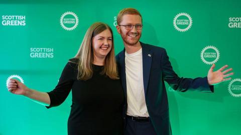 Smiling Gillian Mackay and Ross Greer