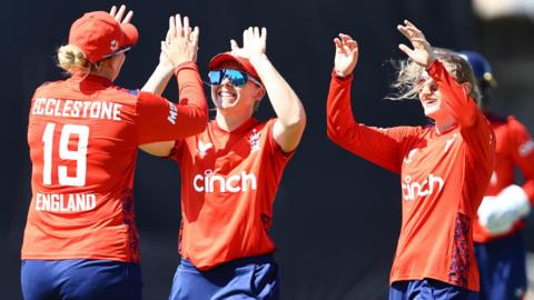 Charlie Dean celebrates a wicket