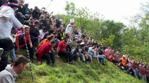 Men at top of hill