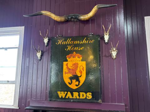 A sign that hung outside a Sheffield pub has been unexpectedly returned to the premises after being missing for more than 25 years.