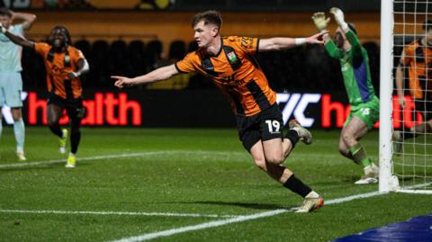 Mark Shelton celebrates scoring for Barnet