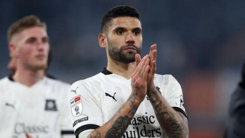 Victor Palsson claps the fans