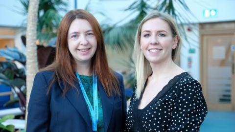 Michelle Le Cheminant with Dr Ruth Copeland. The two women are stood next to each other and smiling at the camera.