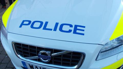 A Devon and Cornwall Police car bonnet, with the word "police" on it