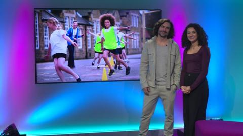 Nina and Joe Wicks on Newsround set