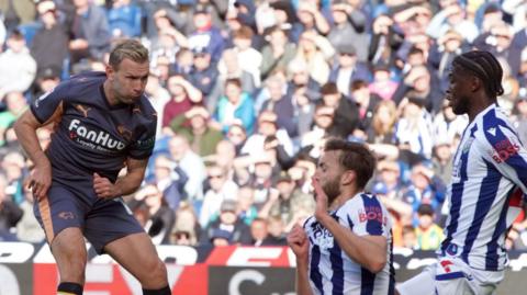 Andreas Weiman shoots and scores for Derby against West Brom