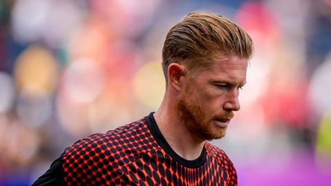 Kevin De Bruyne warms up for Belgium