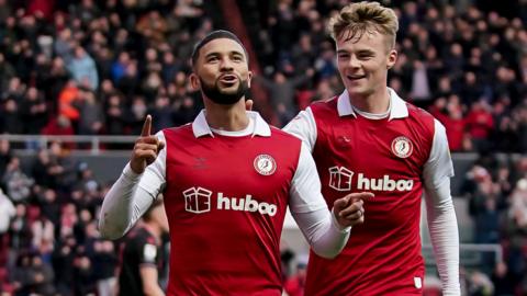 Nahki Wells celebrating a goal alongside then-Bristol City team-mate Tommy Conway in December 2022