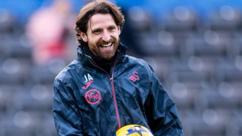 Joe Allen before a Swansea game this season 