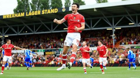 Wrexham striker Kieffer Moore celebrates
