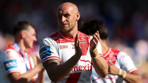 Hull KR player Dean Hadley applauds supporters