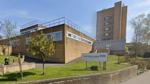 Google street view of the back of Yeovil District Hospital. There's a sign saying NHS and Yeovil District Hospital