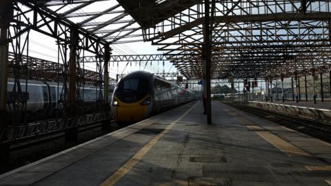 A generic image of a train at a railway station platform 