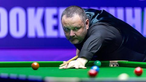 Stephen Maguire eyes up a tricky brown during the Wuhan Open