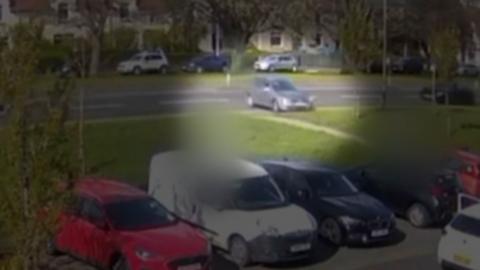 William Budge was caught on camera hitting his wife before driving over her again