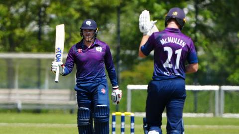 Richie Berrington is applauded by Brandon McMullen