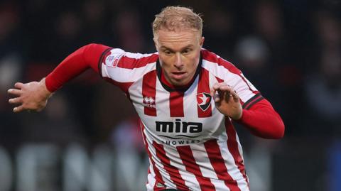 Ryan Broom in action for Cheltenham Town