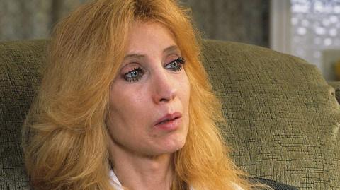 Eminem's mother Debbie Nelson, then Debbie Mathers, sits inside her house in Detroit, Michigan, in 2005