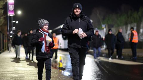 Burnley fans make their way to Turf Moor