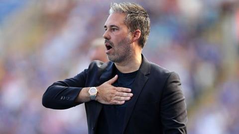 Leicester City manager Marti Cifuentes taps his chest