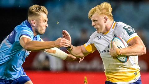 Tommy O'Brien runs with the ball