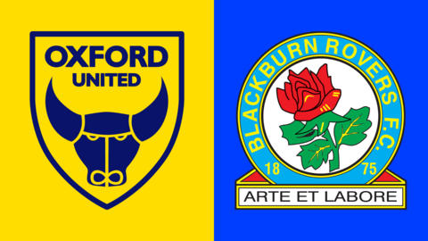 The club badges of Oxford United and Blackburn Rovers side by side. The Blackburn one shows an ox drawn in blue inside a shield with Oxford United written above it on a yellow background. Blackburn have a red rose inside a light blue circle with Blackburn Rovers FC written in yellow inside it